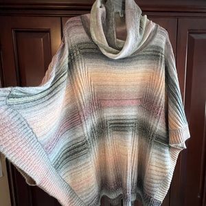 Boutique sweater/poncho combination. Beautiful and fun!
